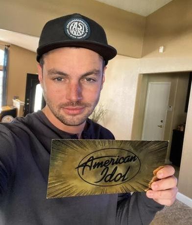 Chayce Beckham holding Golden Ticket